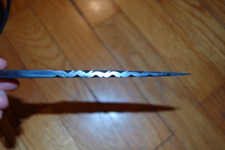 Knife back with vine file work