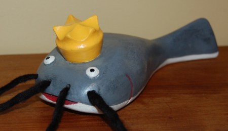 Hand Carved Wooden Catfish Toy with a crown