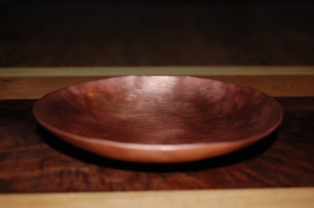 Hand raised copper bowl