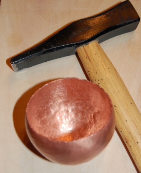 Blacksmithing Hammer used to raise copper vessel