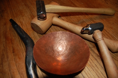 Raising hammers, stake, and hand hammered copper bowl