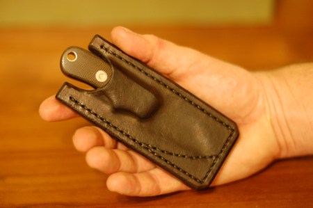 Fixed blade pocket knife in leather sheath Bob Loveless style